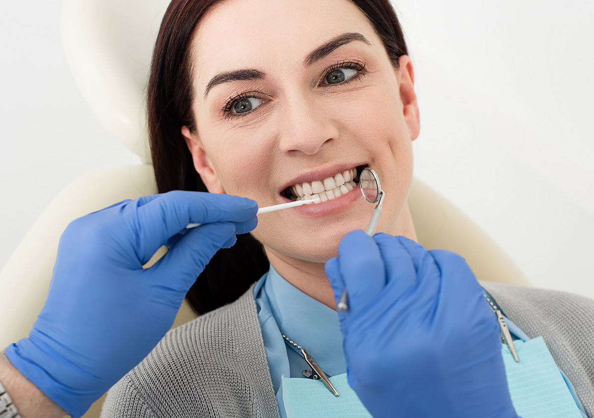 A patient is receiving dental treatment.